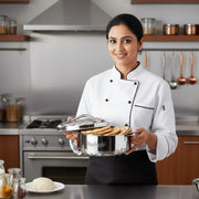 Chef in white uniform holding MaxFresh stainless steel container with freshly cooked flatbreads in modern kitchen
